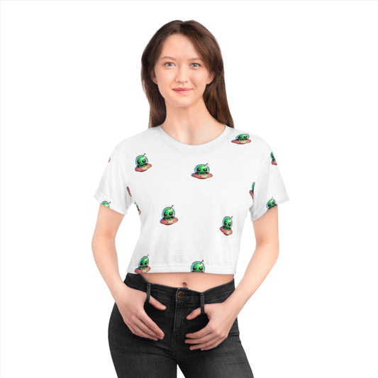 Attention: Calling all space princesses and cosmic adventurers! Gear up for interstellar style with this adorable Luna the Plush Pilot crop top! Featuring Luna nestled inside her brightly colored pink UFO, this design is a must-have for anyone who loves a touch of extraterrestrial charm.